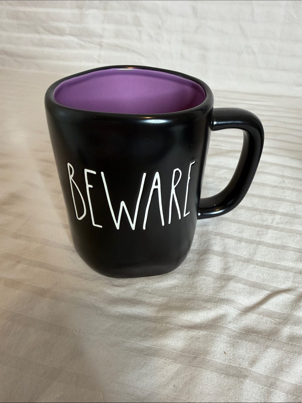 Rae Dunn Black Mug with Purple Interior - 'BEWARE'